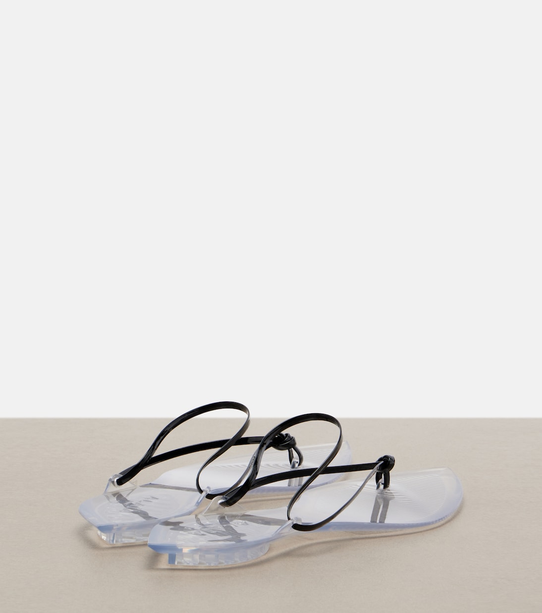 Alaia Invisible Leather Thong Sandals