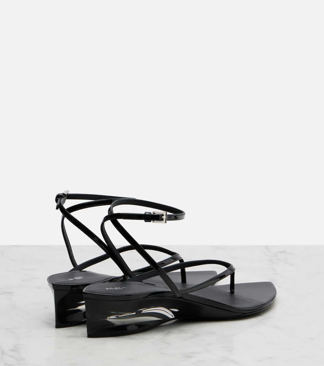 Alaia Invisible Patent Leather Thong Sandals